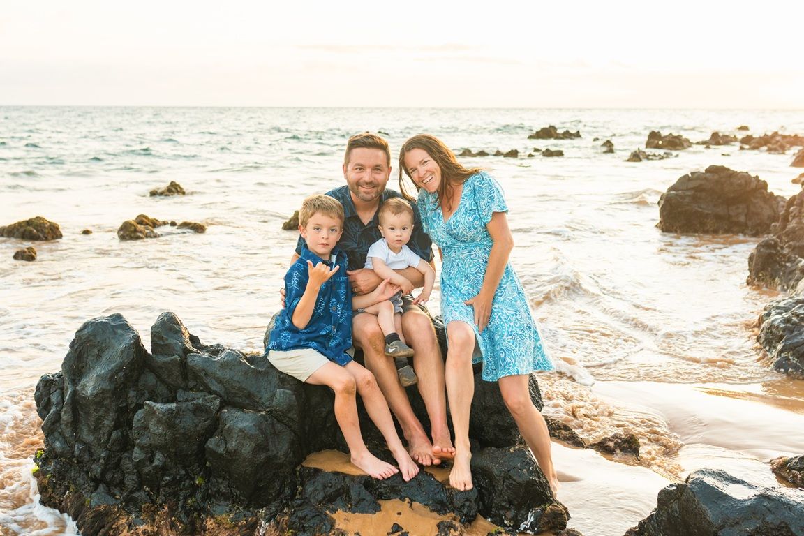 Maui family photographer photo against beautiful Maui sunset beach by ohwowfotos.