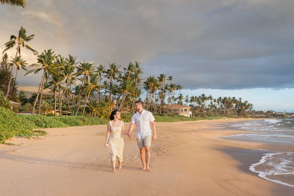 Maui couple photographer photo against beautiful Maui sunset beach by ohwowfotos.