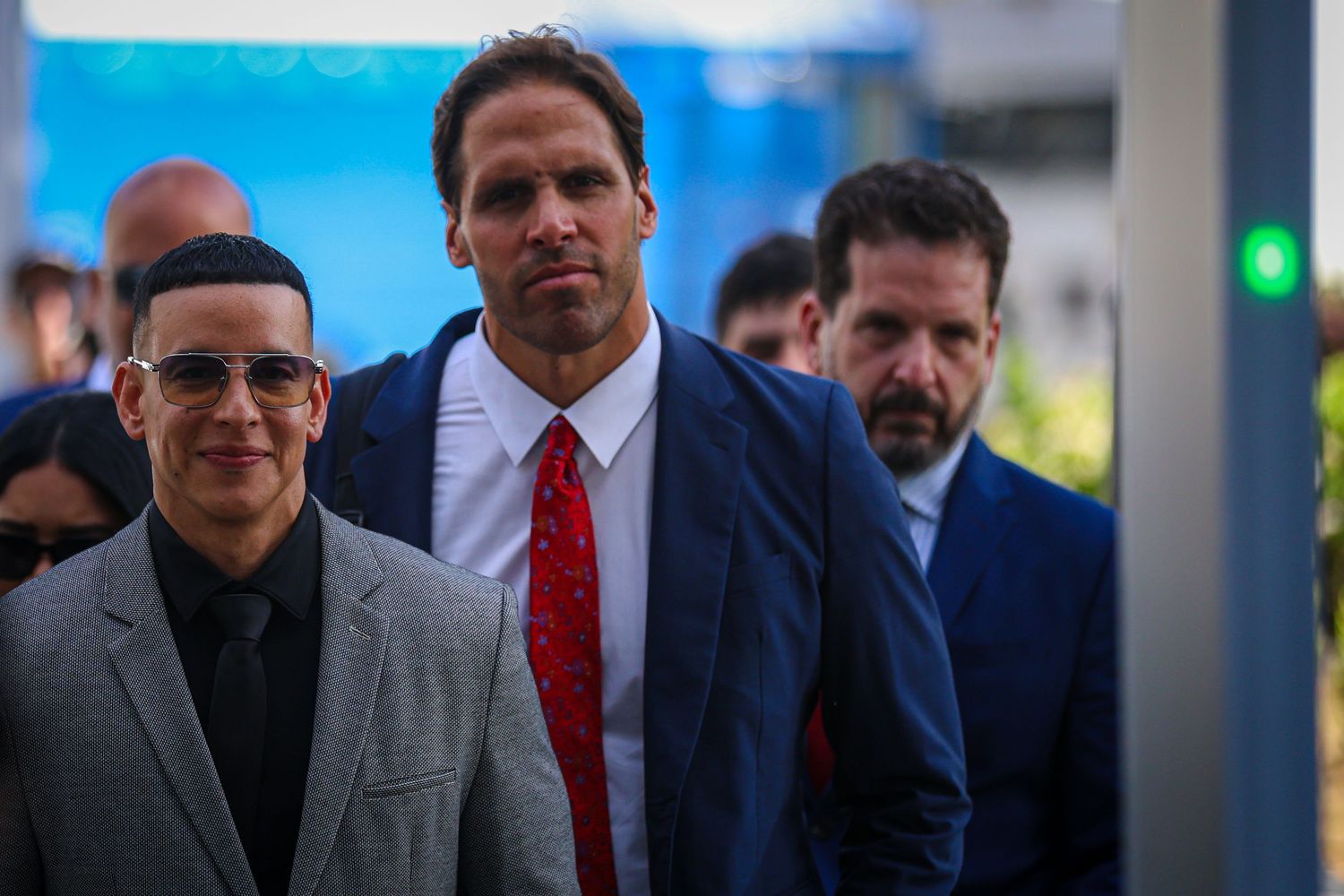 Daddy Yankee leaves federal court in San Juan after a hearing in his $12 million lawsuit.
