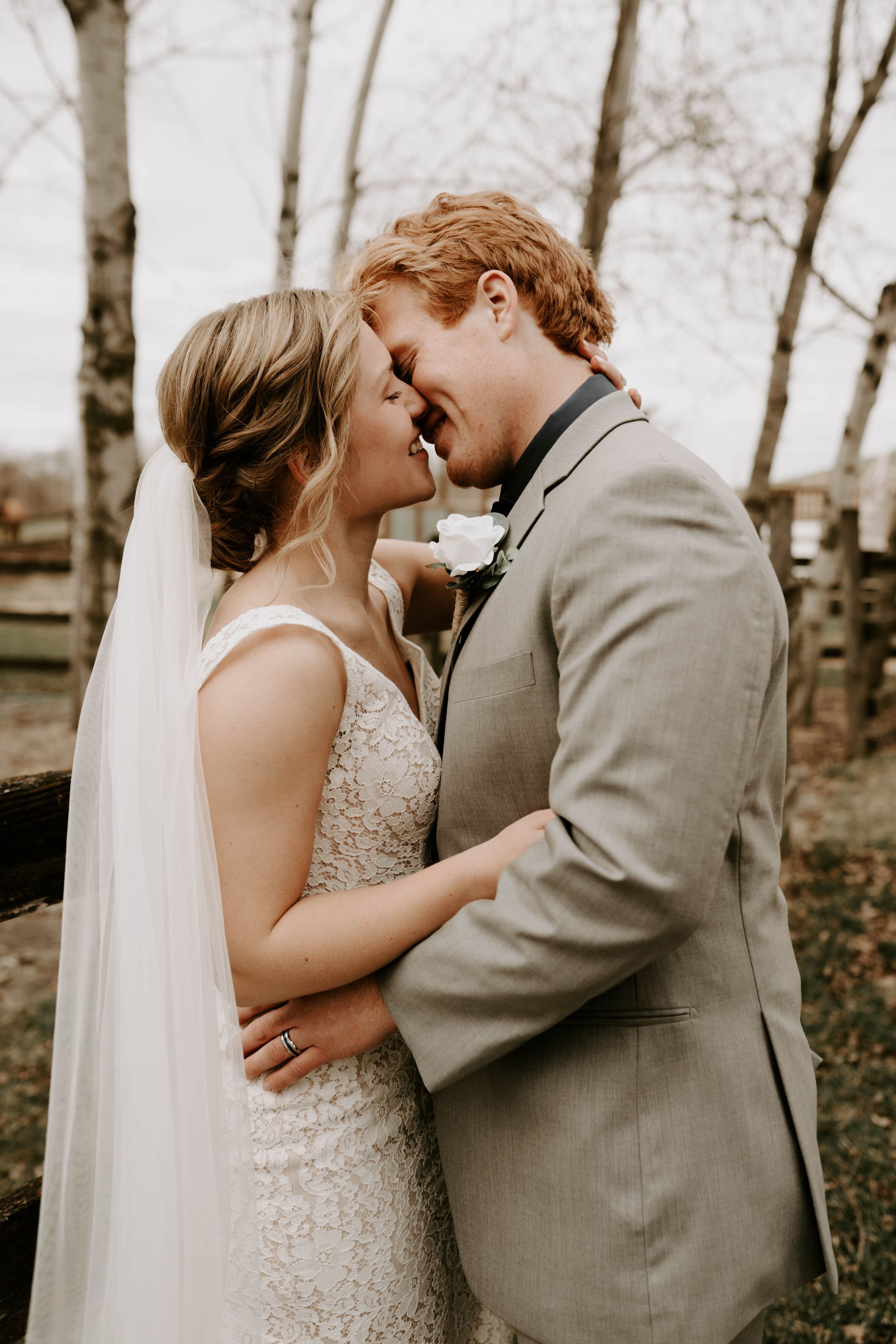 Intimate wedding couple portraits showing emotional first look reactions.