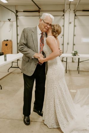 Candid wedding interactions showing laughter and joy in an indoor venue.