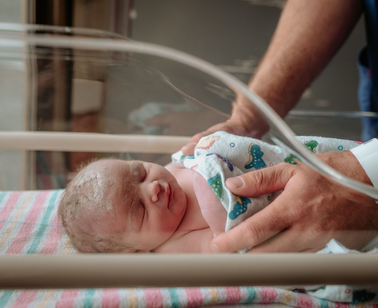 Medical monitoring equipment and newborn care in a hospital setting.