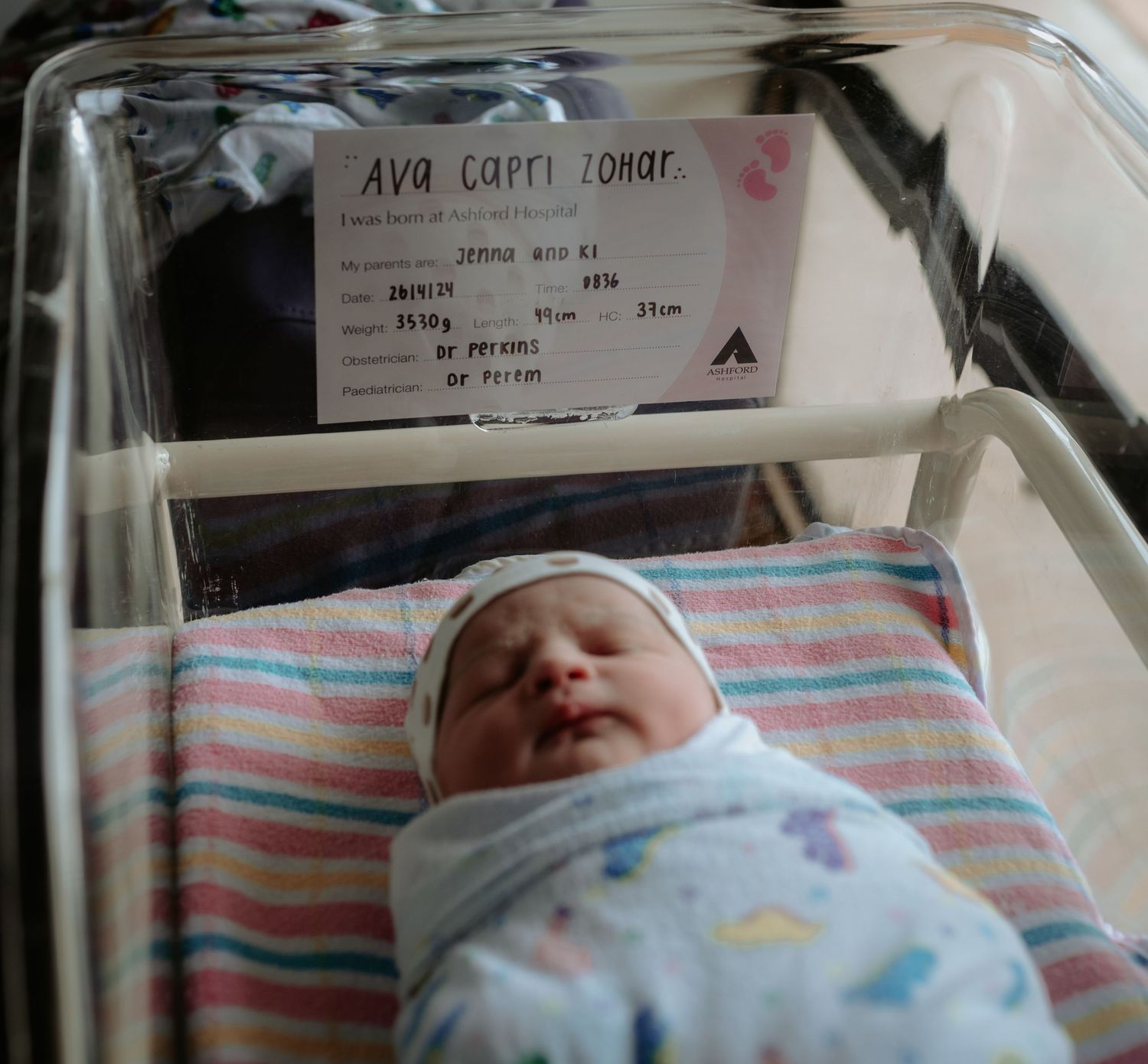 Hospital monitoring equipment and newborn care details in a medical setting.