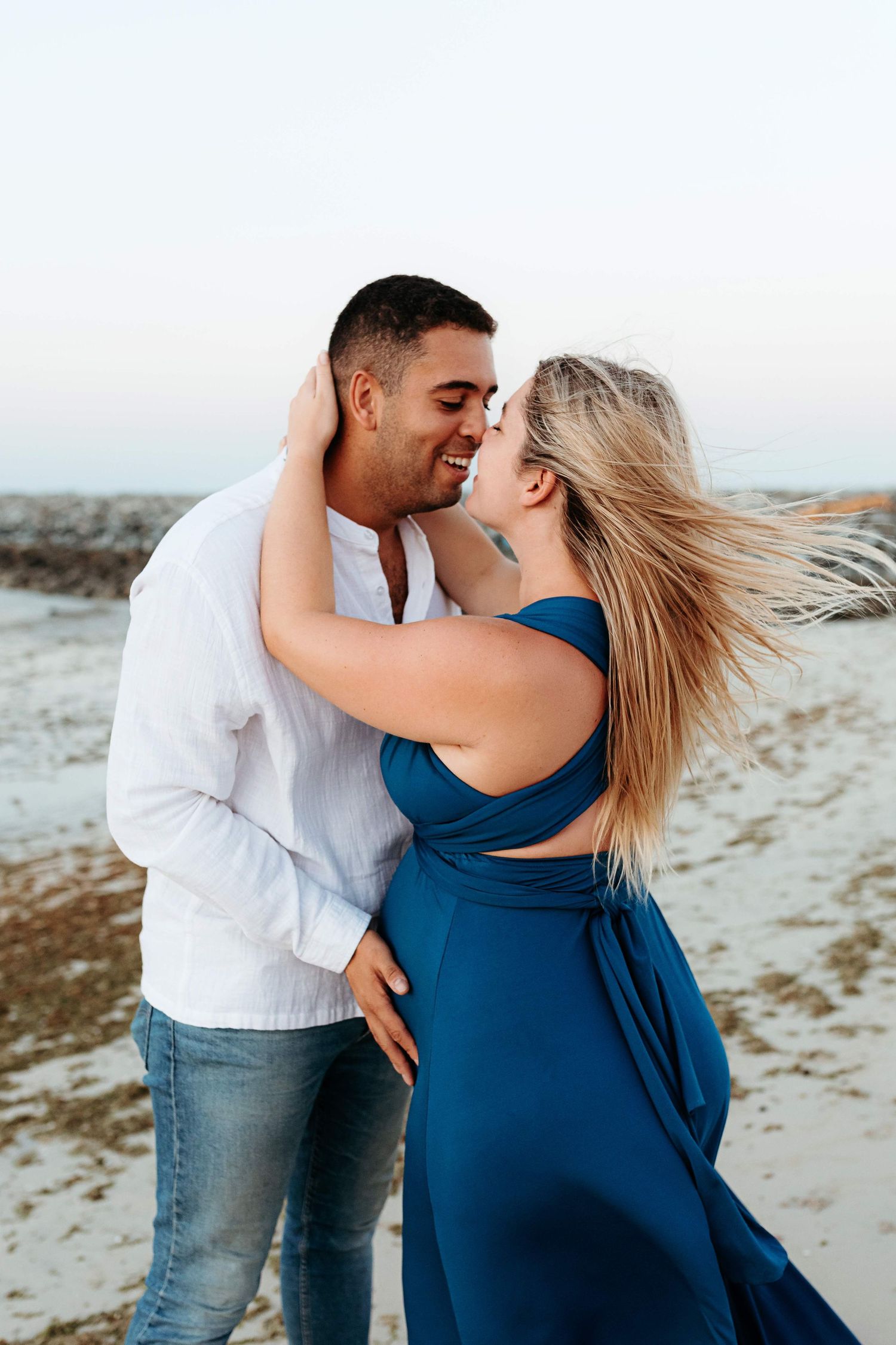 beach photoshoot in abu dhabi clinet closet options red dress