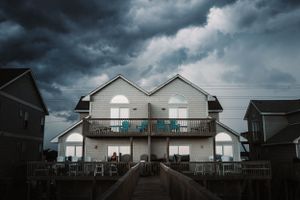 Summer thunderstorm rolls in over beach house in Topsail Beach, NC