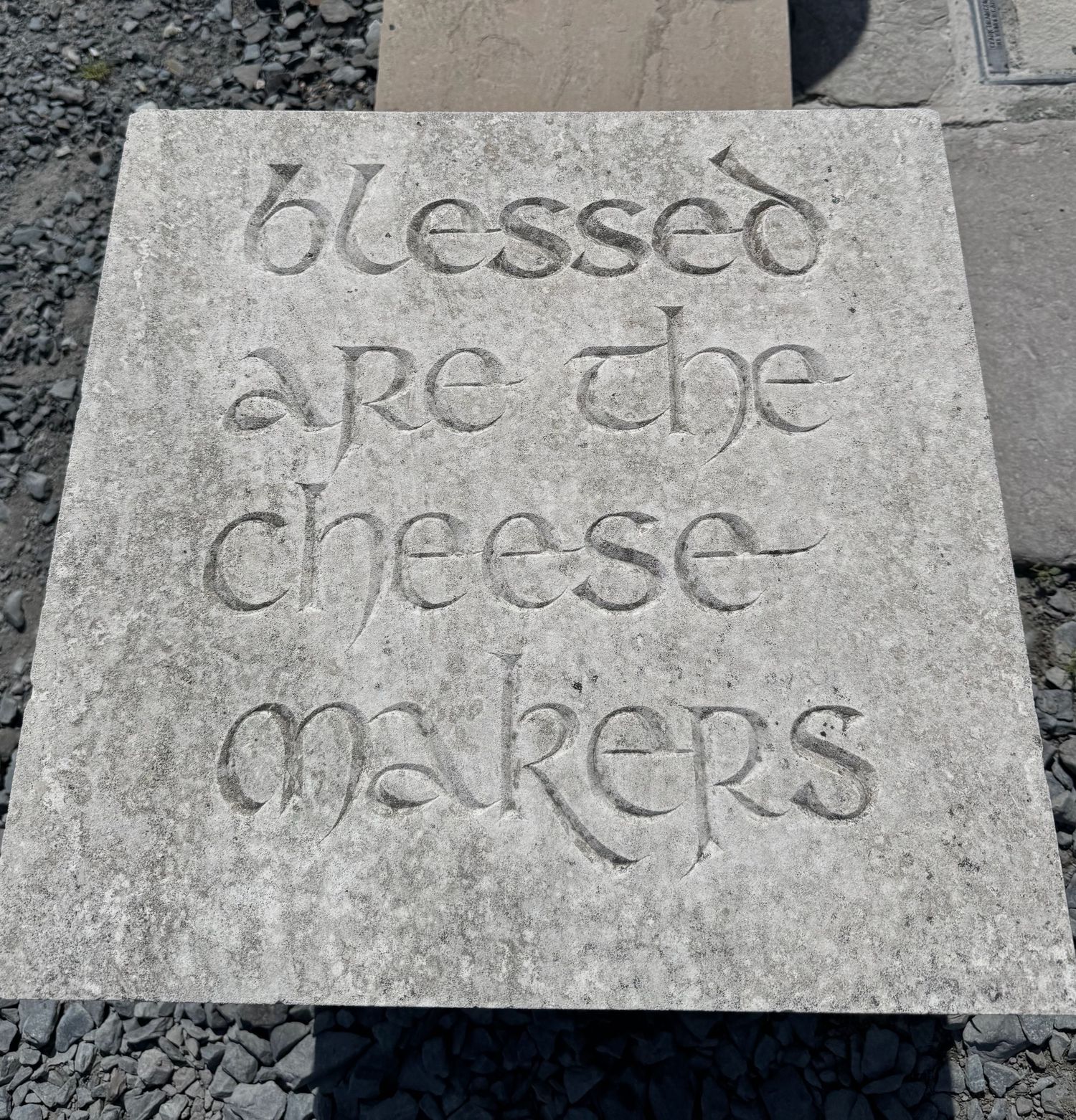 Stone cheese sign at the court yard dairy in North Yorkshire