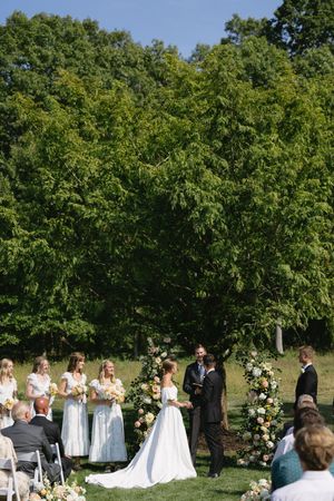 A sequence of wedding ceremony photos showing couples and guests gathered outdoors under green trees on a sunny day.