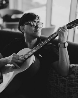 Black and white photo series showing someone playing a ukulele in different poses against a light background.