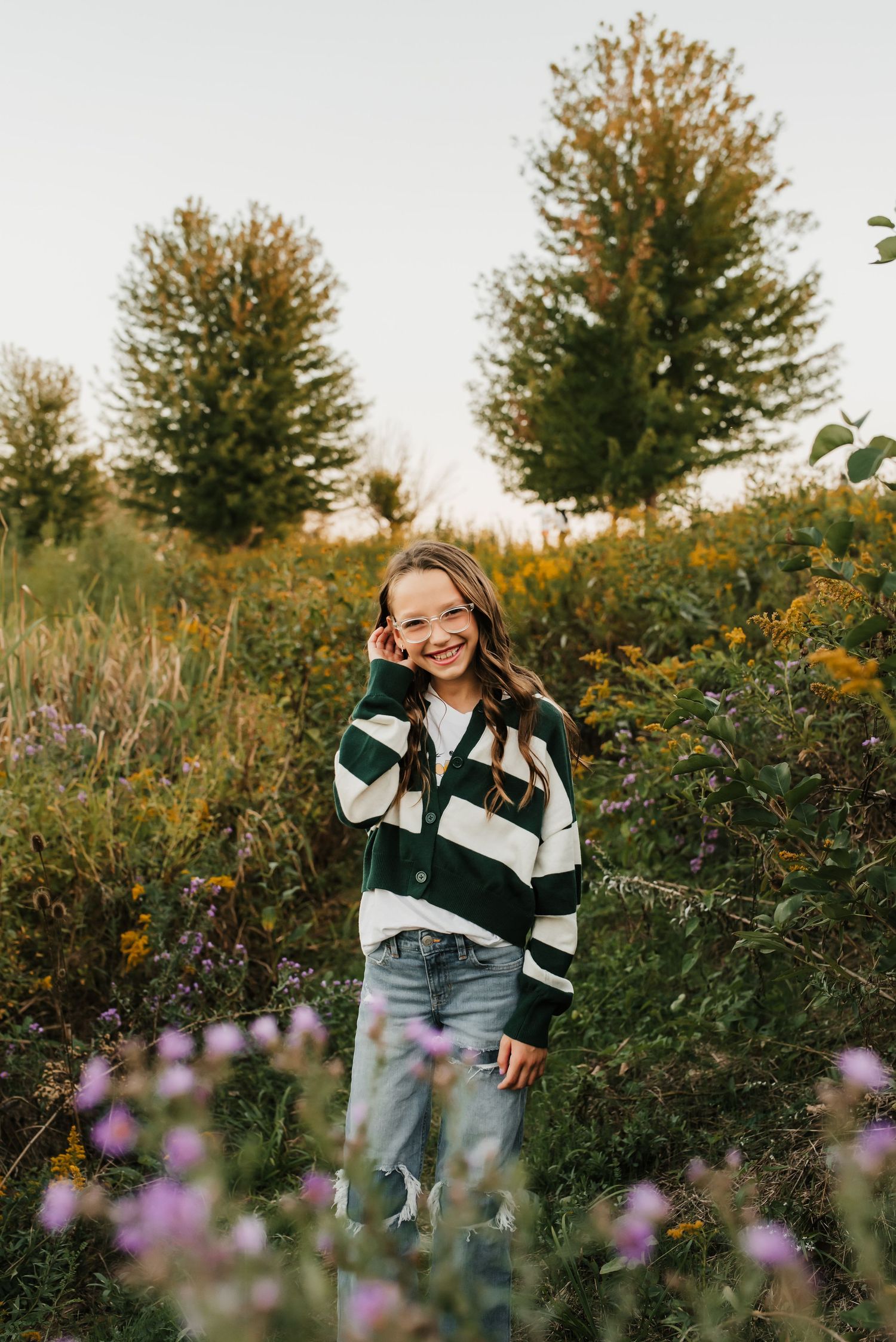 beautiful girl poses during family mini session in cincinnati
