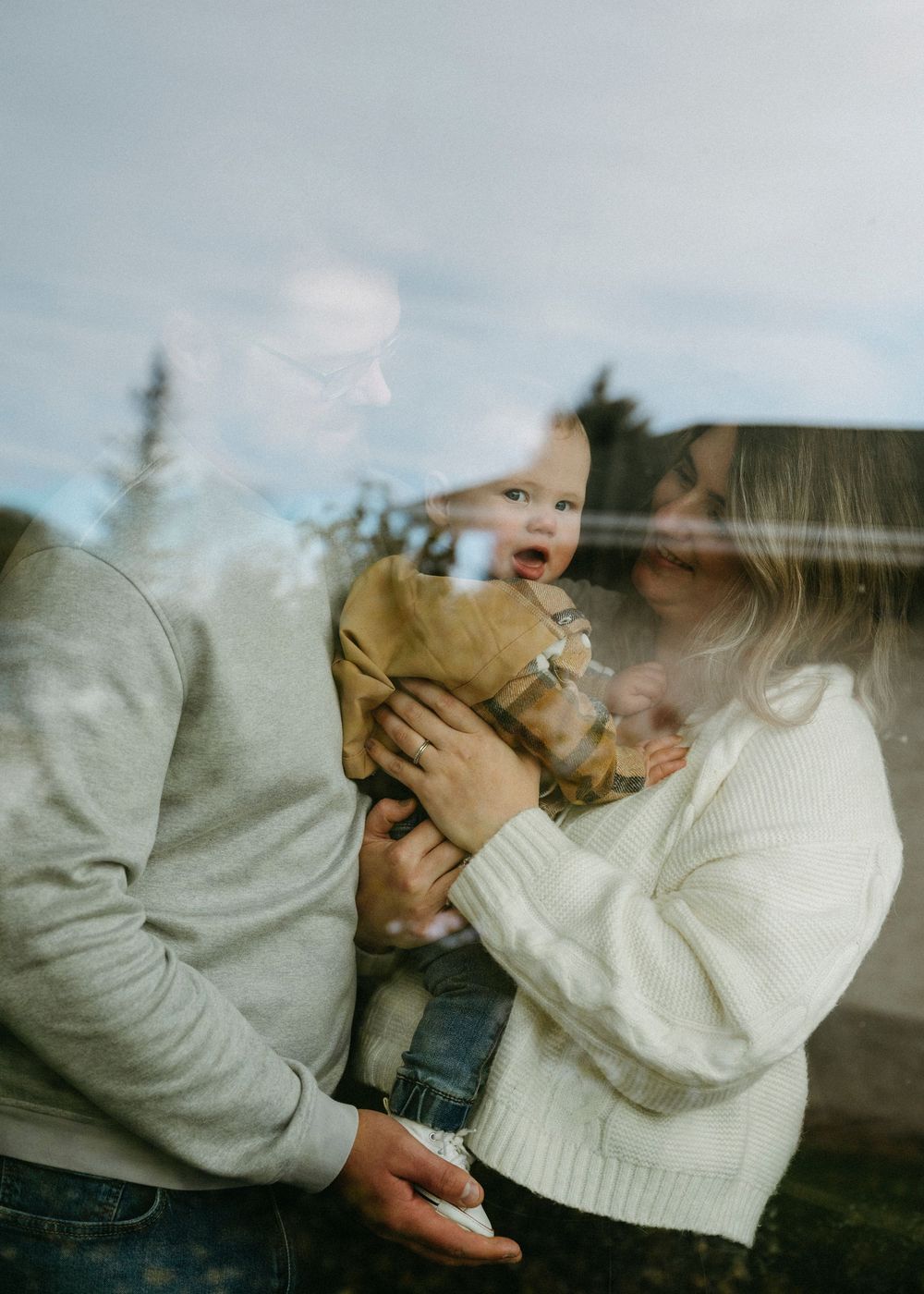 Intimate couple photography sequence showing tender embraces and emotional moments in soft lighting.