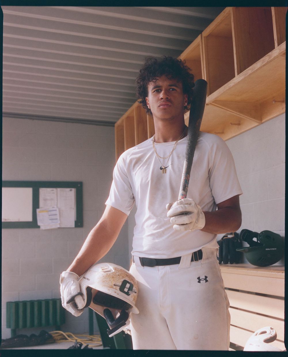 A portrait of a baseball player in uniform made with medium format film