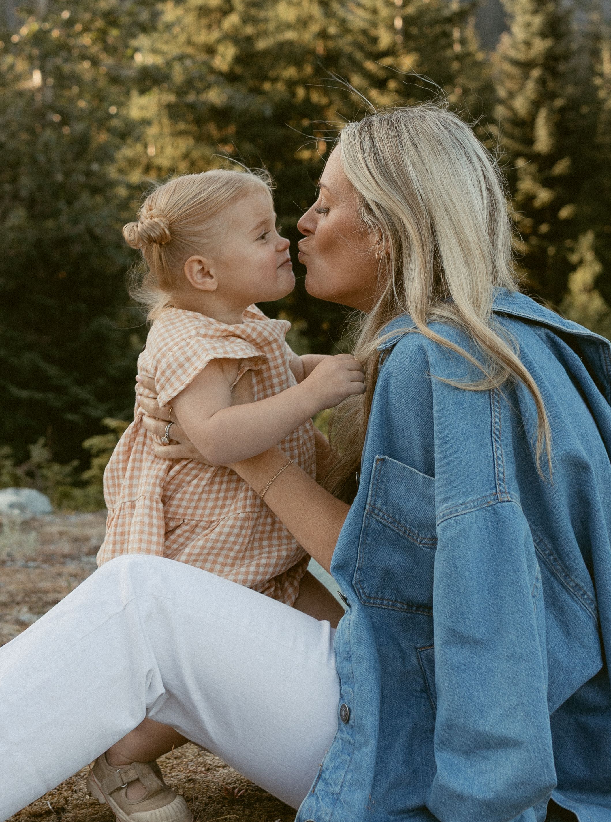 A series of five intimate outdoor portrait photos showing tender moments between parent and child at sunset.