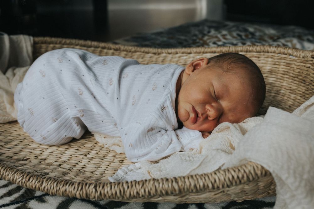 At home newborn photography session newborn baby basket