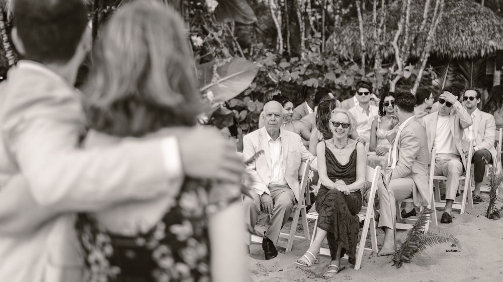 A black and white photo montage showing multiple scenes of people enjoying outdoor activities at a summer camp.