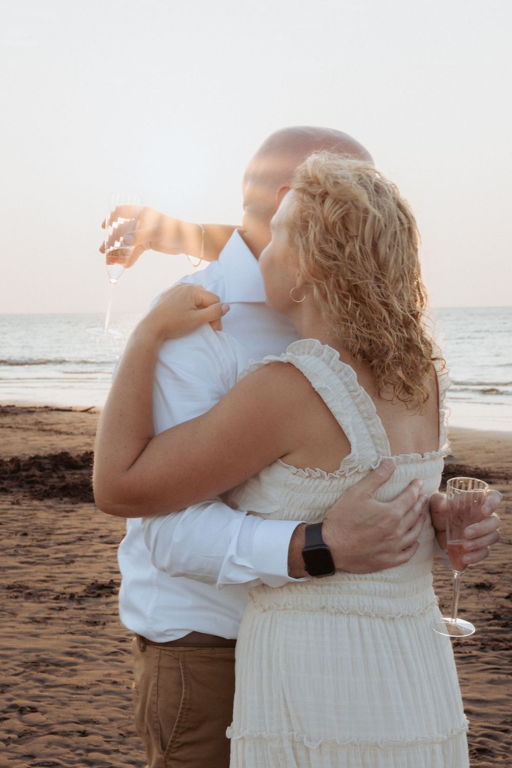bride and groom dancing at sunset, Shediac romantic elopement photography, New Brunswick photographer, beach wedding photography Canada