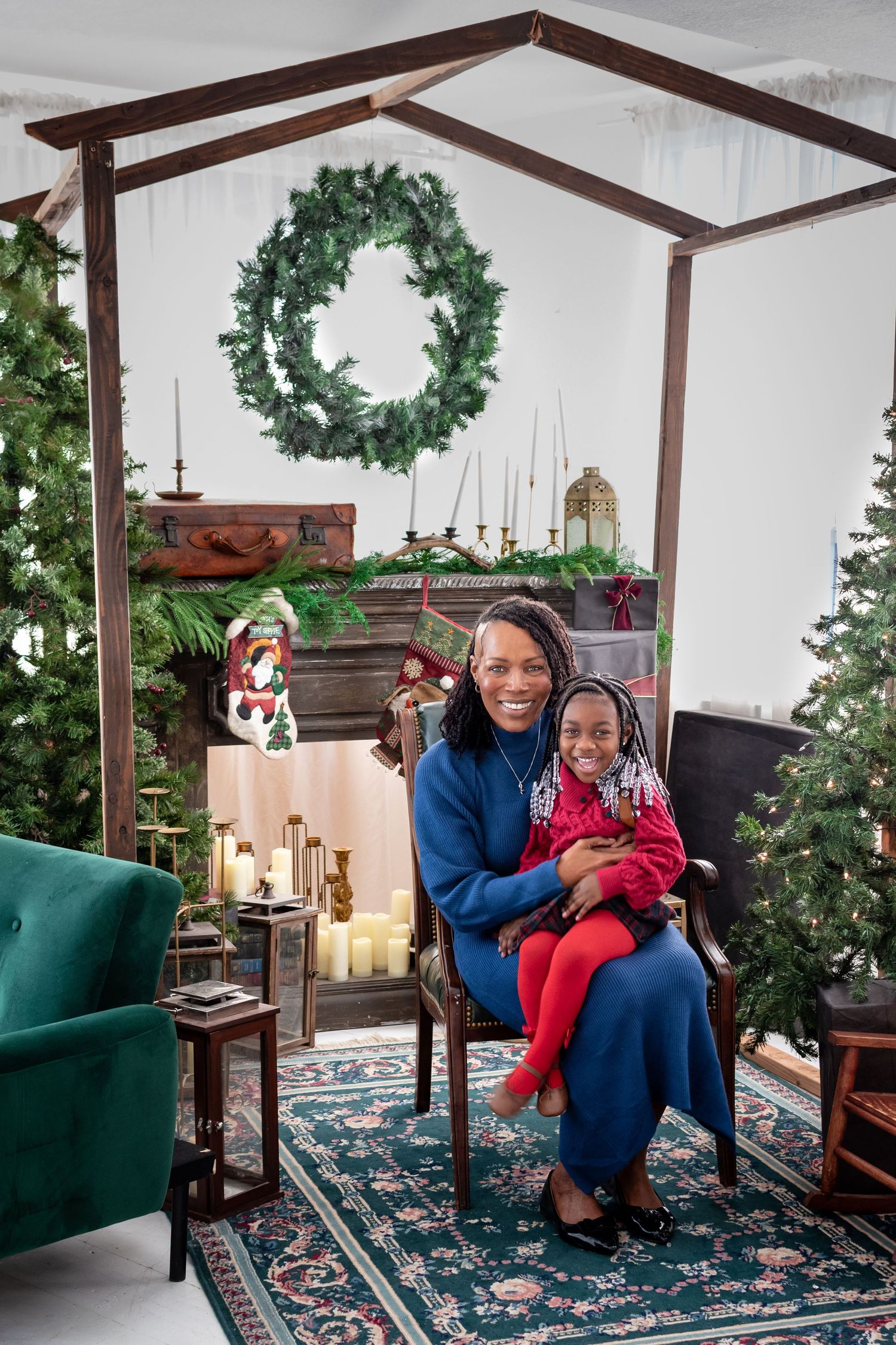 Grandmother and granddaughter sitting together in the Christmas tree studio at IAMCREATIVESPACE Tacoma