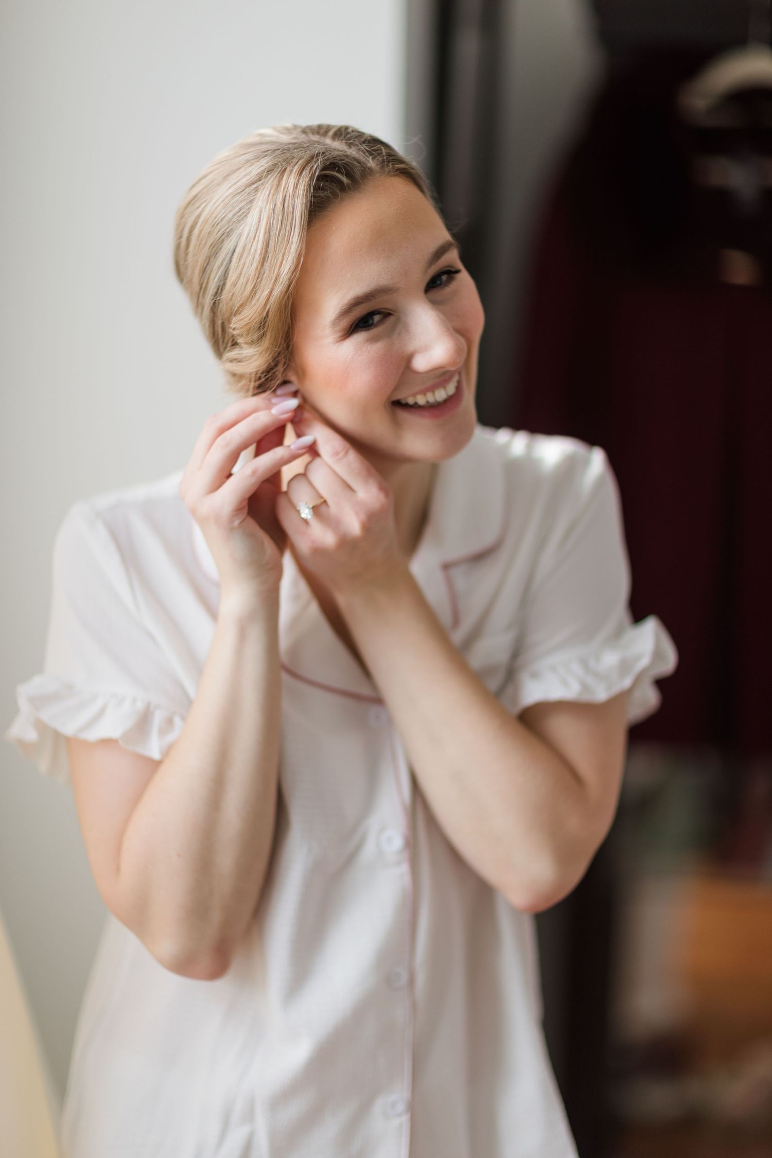 A series of four candid photos showing someone in a white blouse making playful expressions and poses.