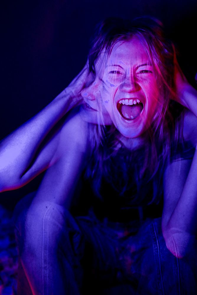 Dynamic series showing emotional expressions under colorful neon lighting.