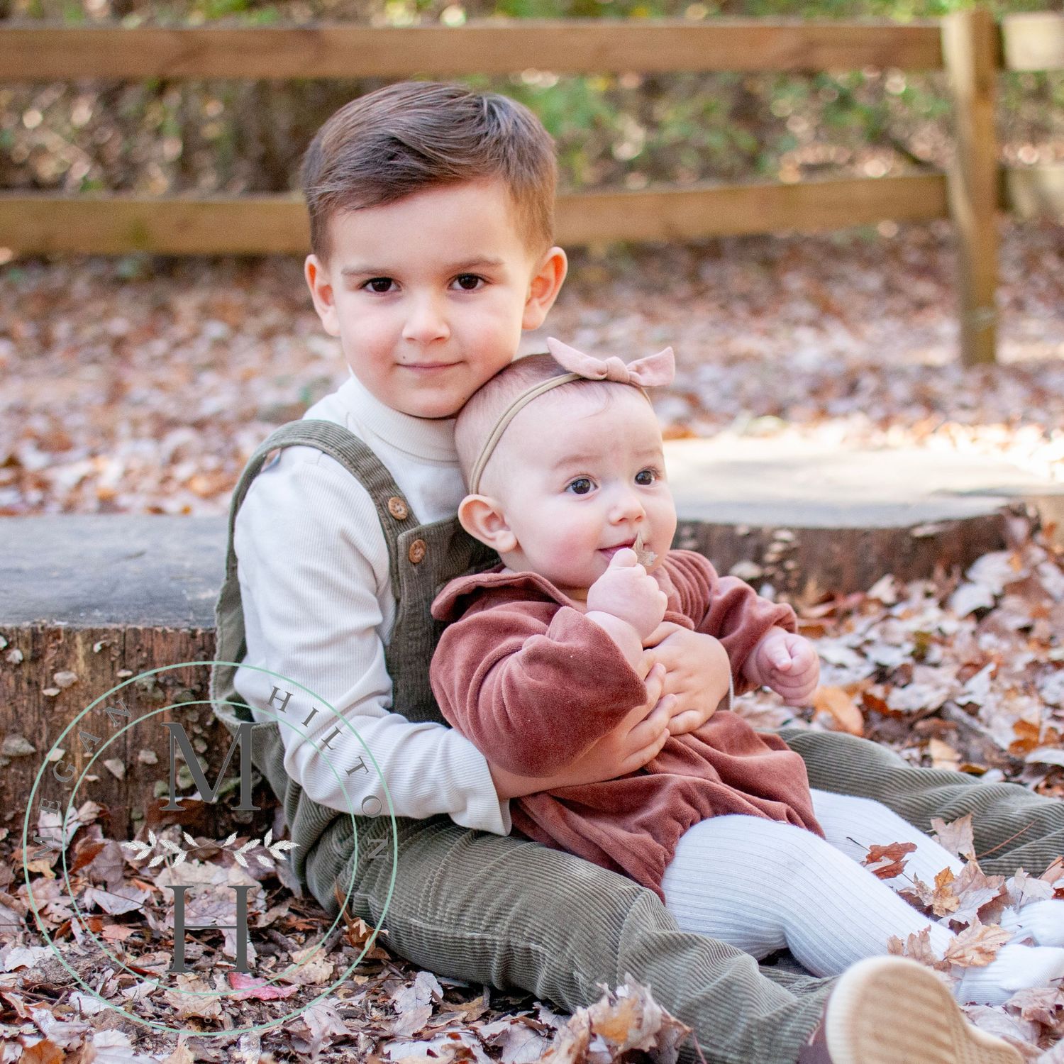 Toddler and infant sitting pose photo