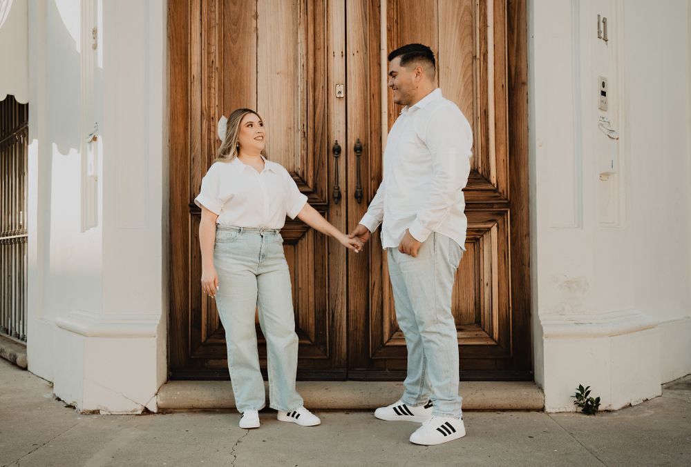 Holding hands, the couple gazes at each other with love, a beautiful moment in Mazatlán