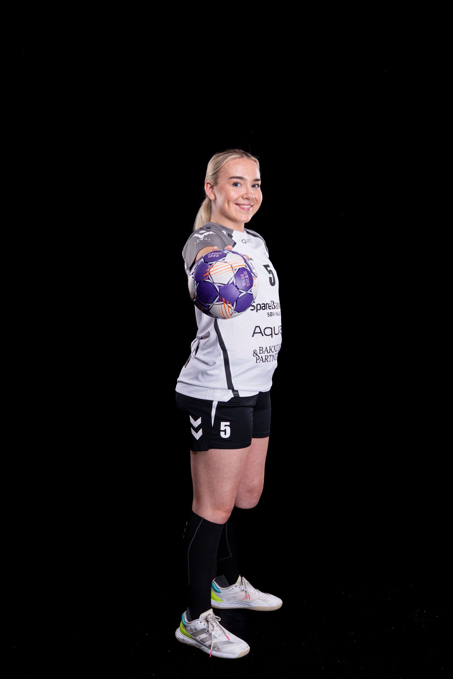 A sequence showing a volleyball player in white uniform demonstrating serving technique from different angles.
