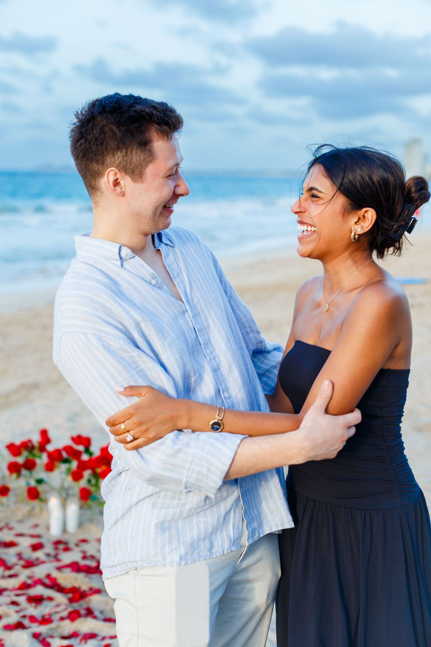 Couples portrait. Marriage proposal on the beach in Isla Verde, Carolina, Puerto Rico.