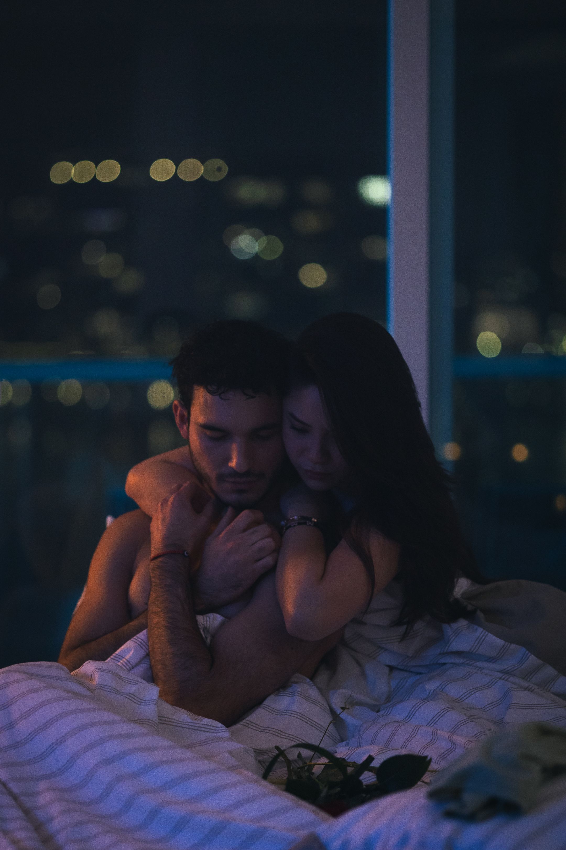 Cinematic portrait of Miami couple in tender embrace, A Star Is Born inspired mood lighting captured by MannyPortrats