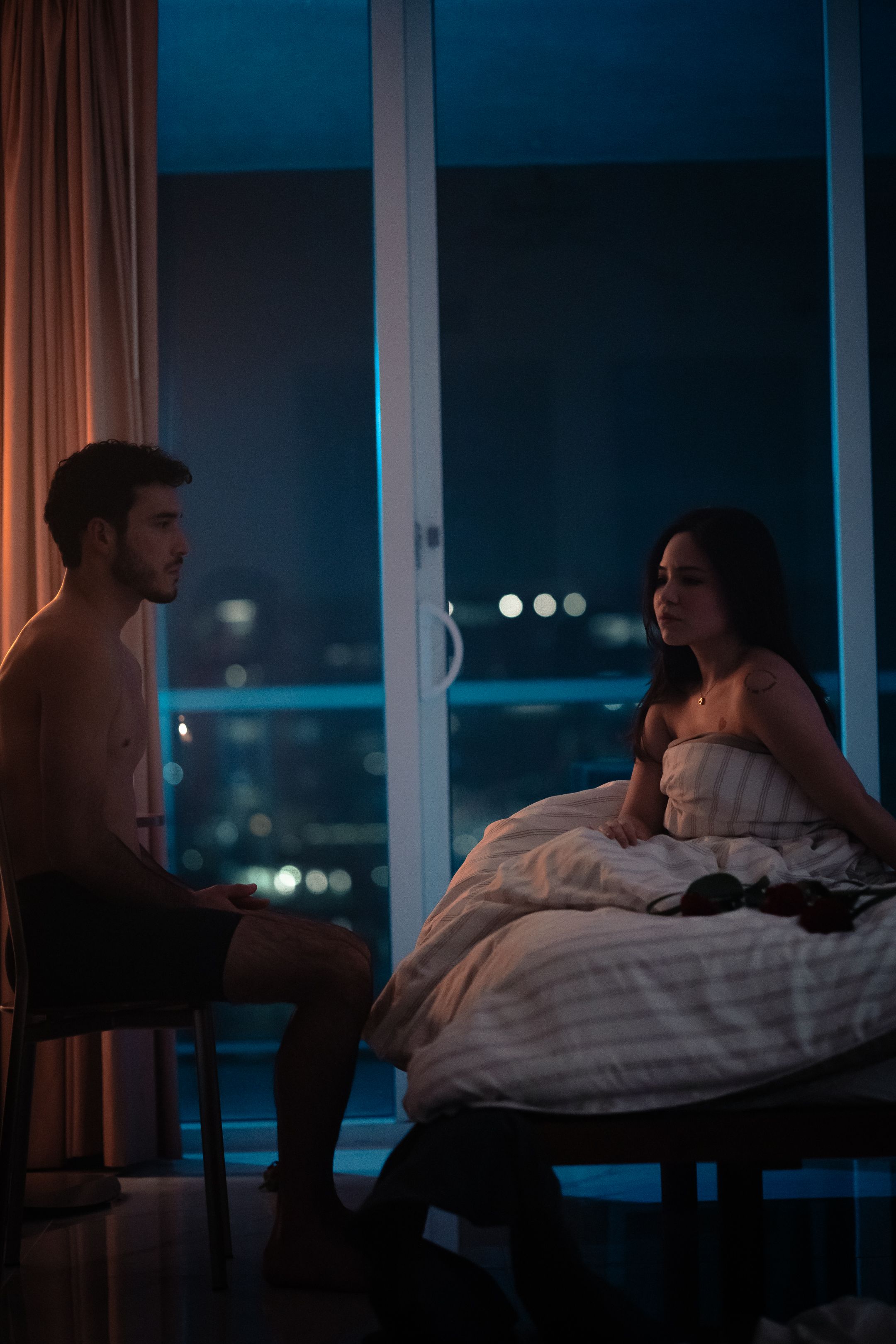 Editorial Miami couple portrait with warm and cool tones, Netflix drama inspired cinematic photography by MannyPortraits.