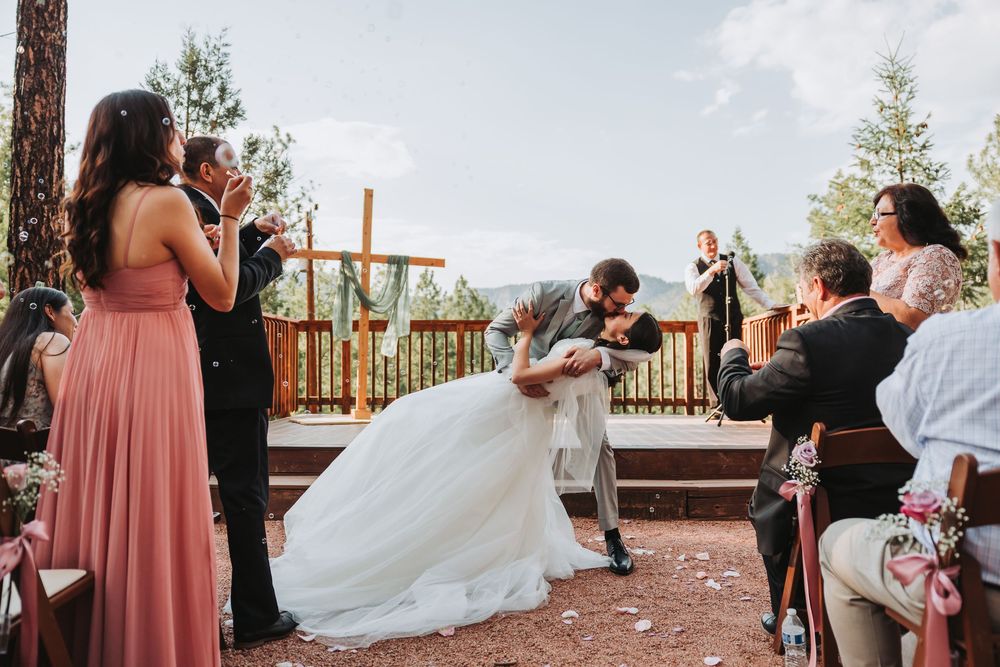 Horizontal collage of wedding celebration moments captured at an outdoor venue with wooden railings and natural scenery.