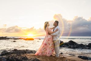 Maui couple photographer photo against beautiful Maui sunset beach by ohwowfotos.