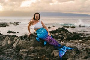Maui family photographer photo against beautiful Maui sunset beach by ohwowfotos.