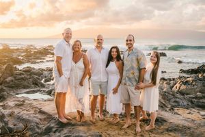 Maui family photographer photo against beautiful Maui sunset beach by ohwowfotos.