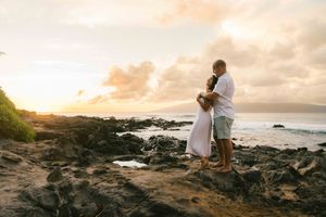 Maui family photographer photo against beautiful Maui sunset beach by ohwowfotos.