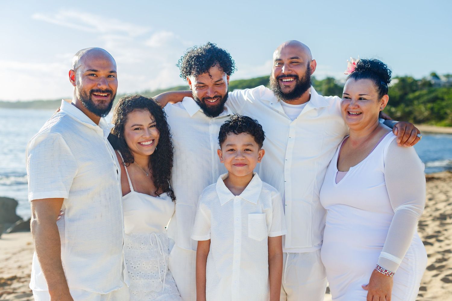 Family portrait on the beach. Playa Mar Chiquita, Puerto Rico.