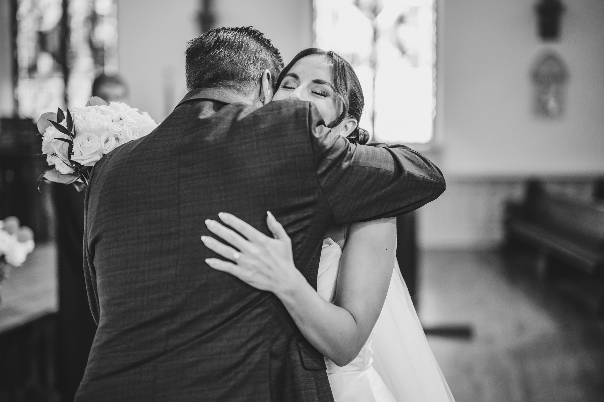 Emotional first dance between newlyweds at an elegant wedding reception.