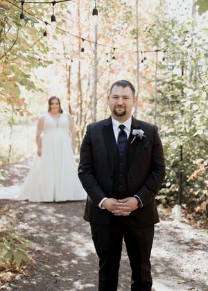 Bride and groom first look at the Grand Ivory, Moncton wedding photographer, fall wedding under colourful leaves outdoor fall wedding
