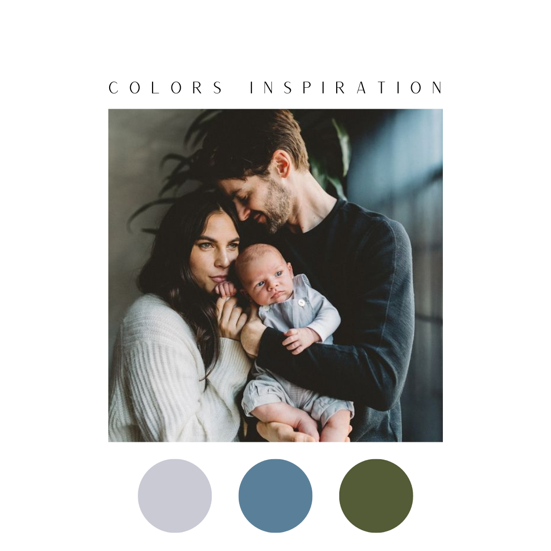 Indoor family portrait with soft gray, blue and green color palette.
