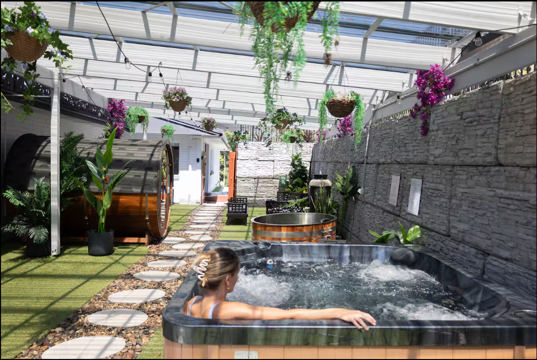 Luxurious infinity pool with glass barriers overlooking scenic mountain views and modern architectural features.