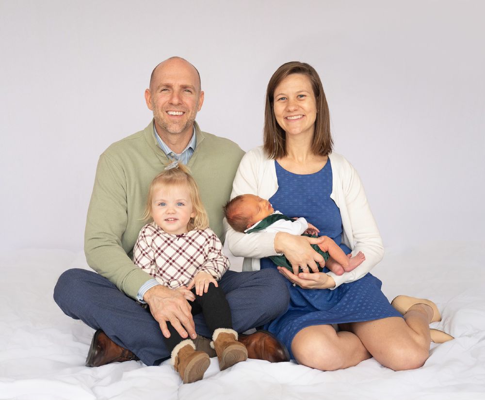 Newborn baby boy with family in natural light studio by Bartlesville Photographer Kristi Bray