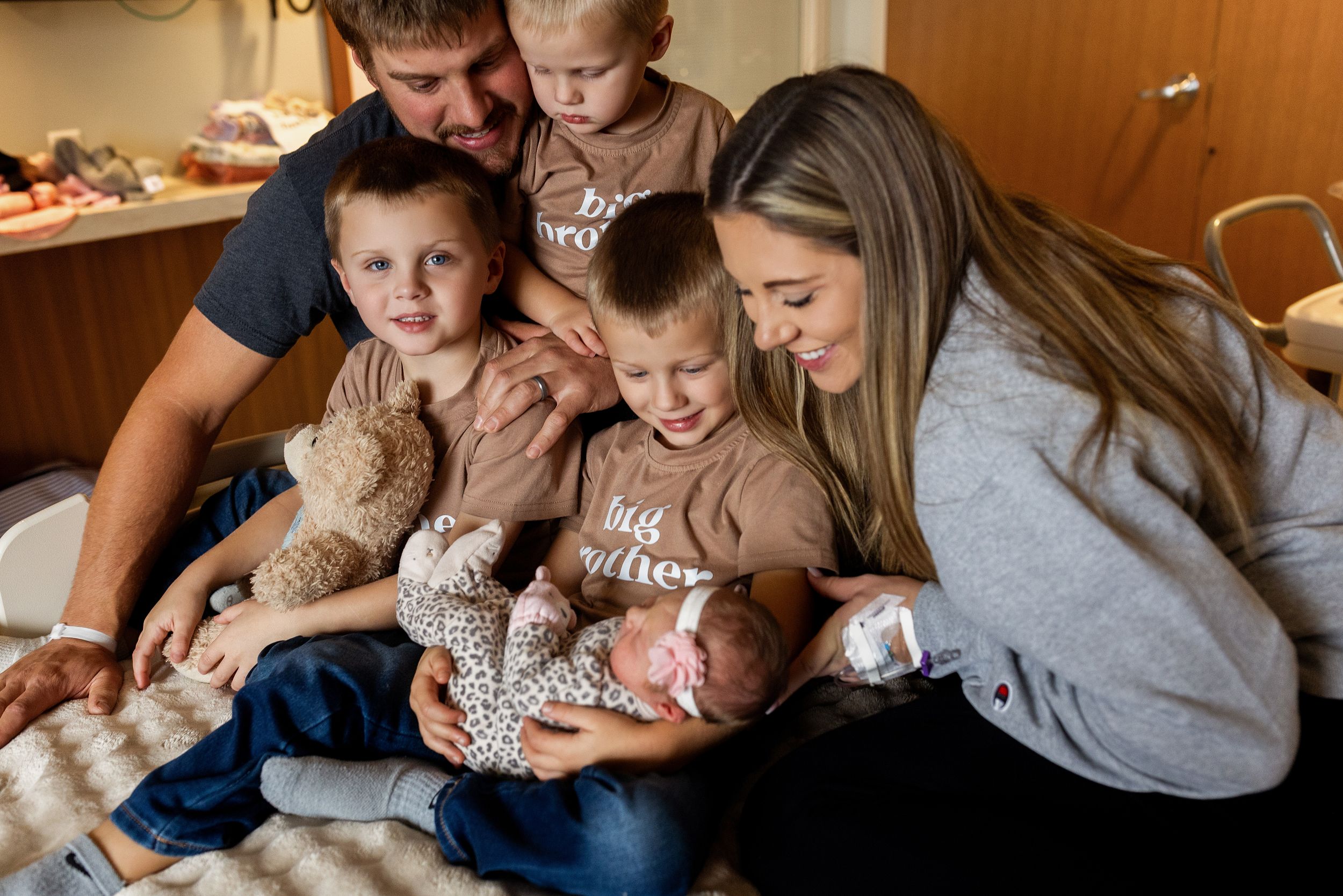 A series of candid family moments showing parents and children cuddling and bonding together on a couch.