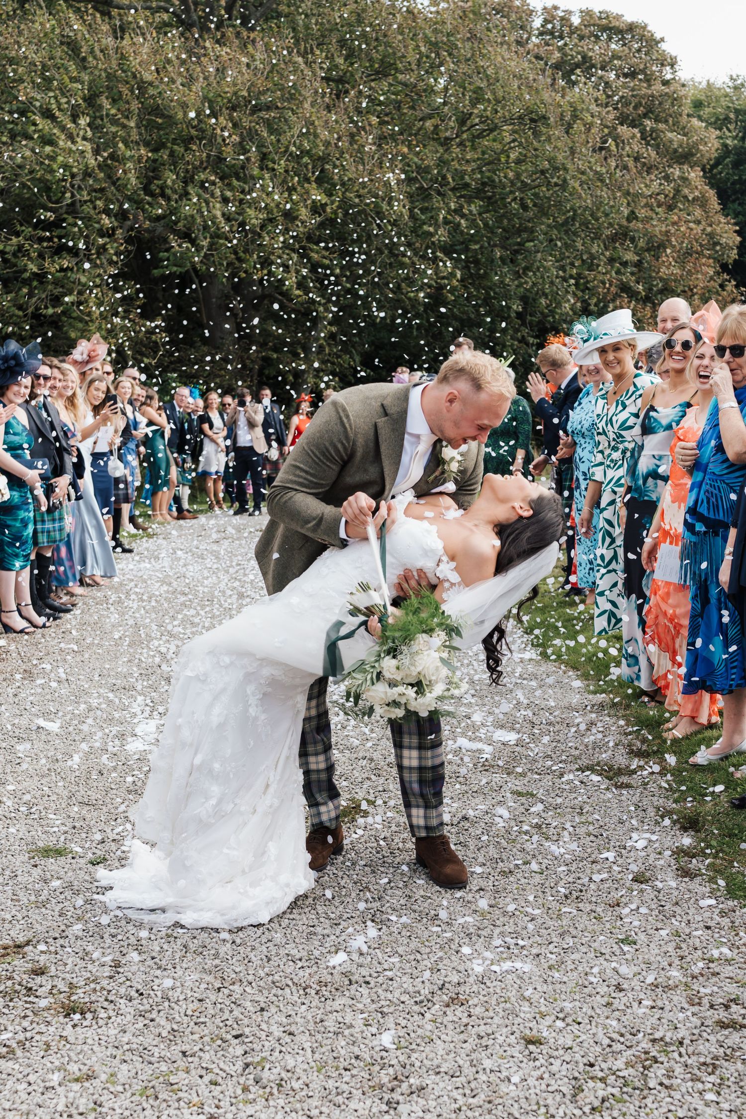 Romantic candid wedding photography, confetti shot