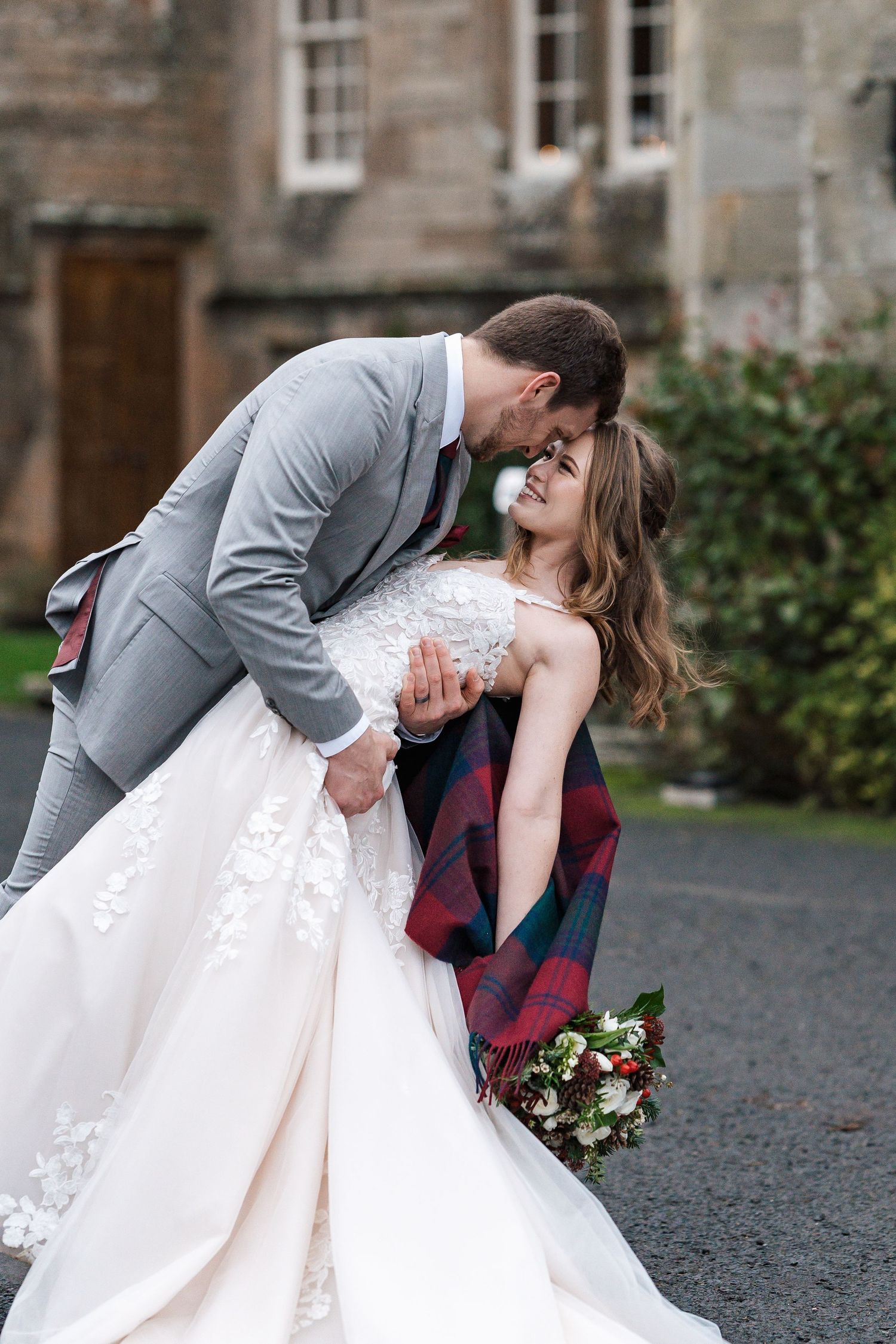 Dip kiss from C&K at Glenapp Castle. Luxury wedding photography.