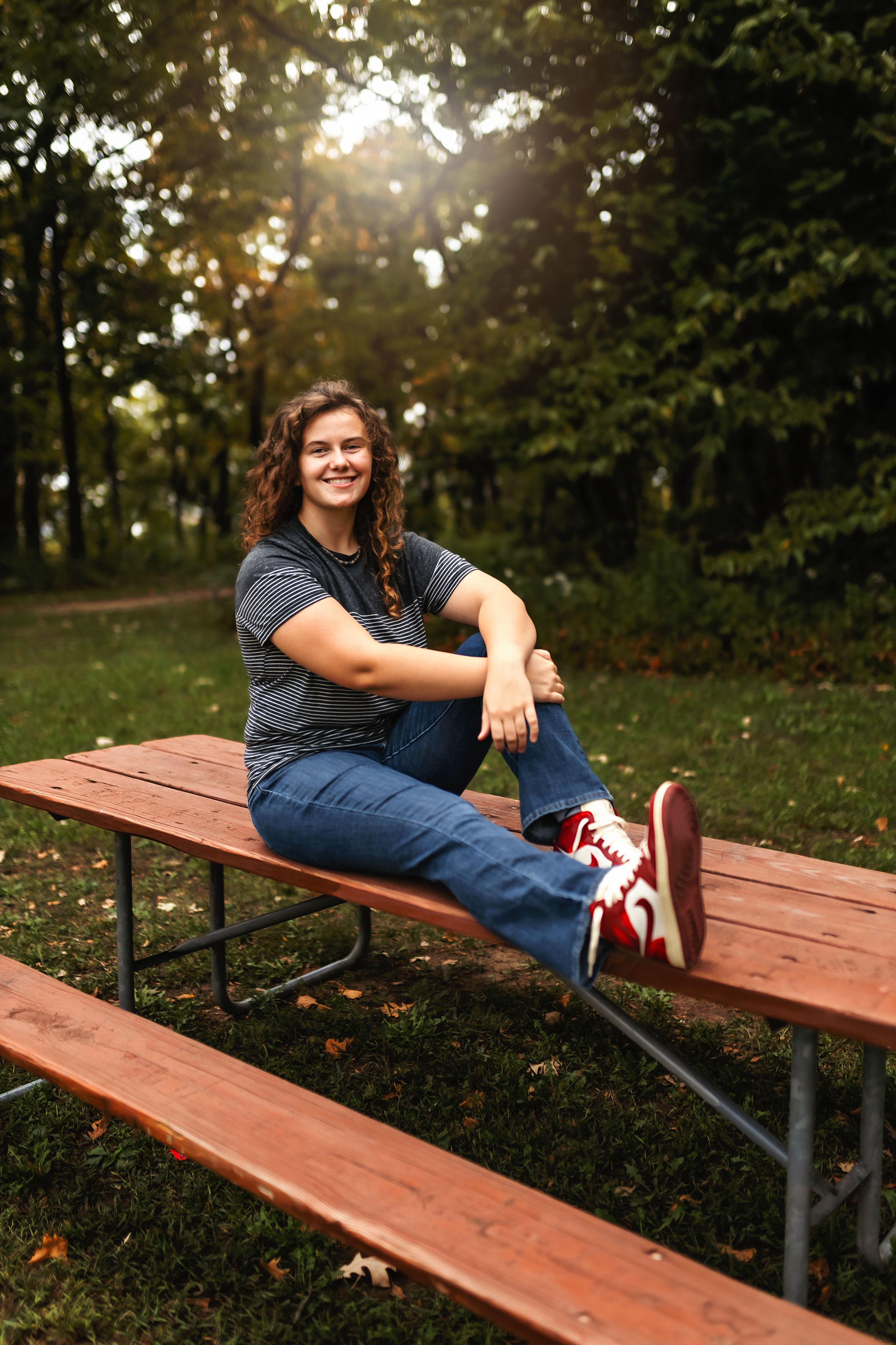 Casual portrait of person sitting on wooden picnic table in park setting.
Janesville, WI
Brodhead, WI