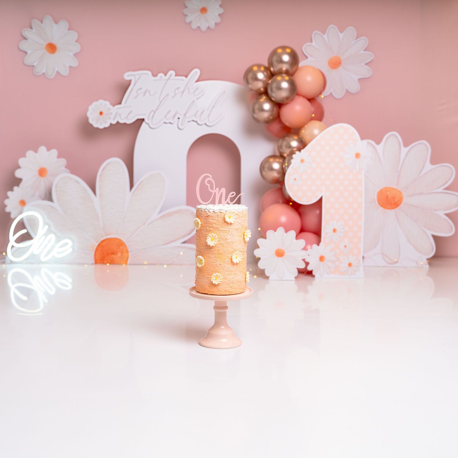 Isn't she wonderful cake smash setup for a 1 year old girl.