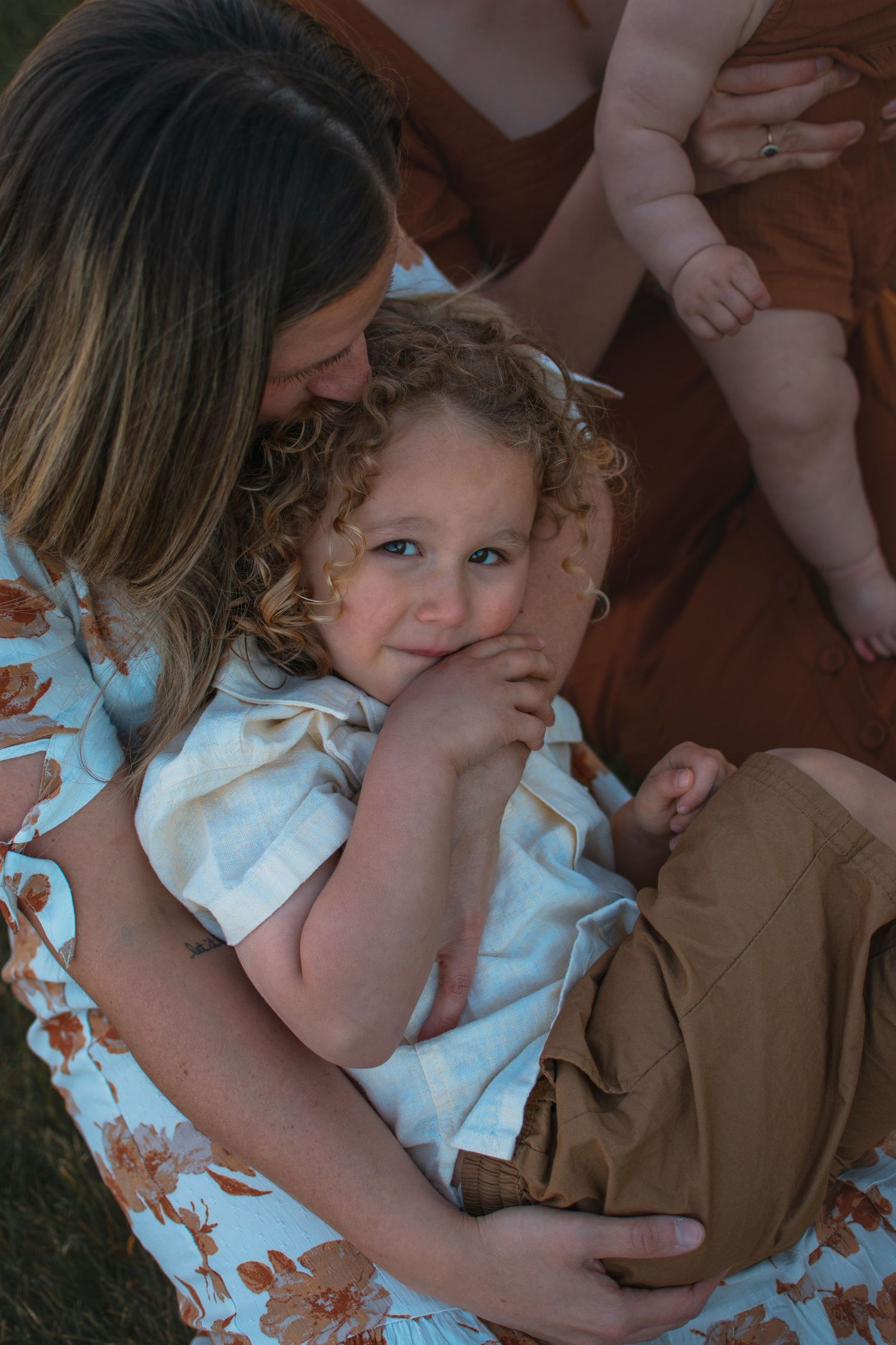 Serene photography captured in a Grand Rapids studio, featuring a peaceful baby posed delicately, perfect for newborn portraits.