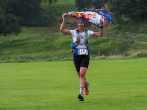 Sky Runner approaching the finish line after tackling Striding Edge