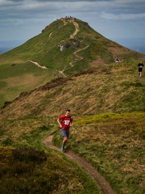 Fell Runner in front of Roseberry Topping, North Yorkshire
