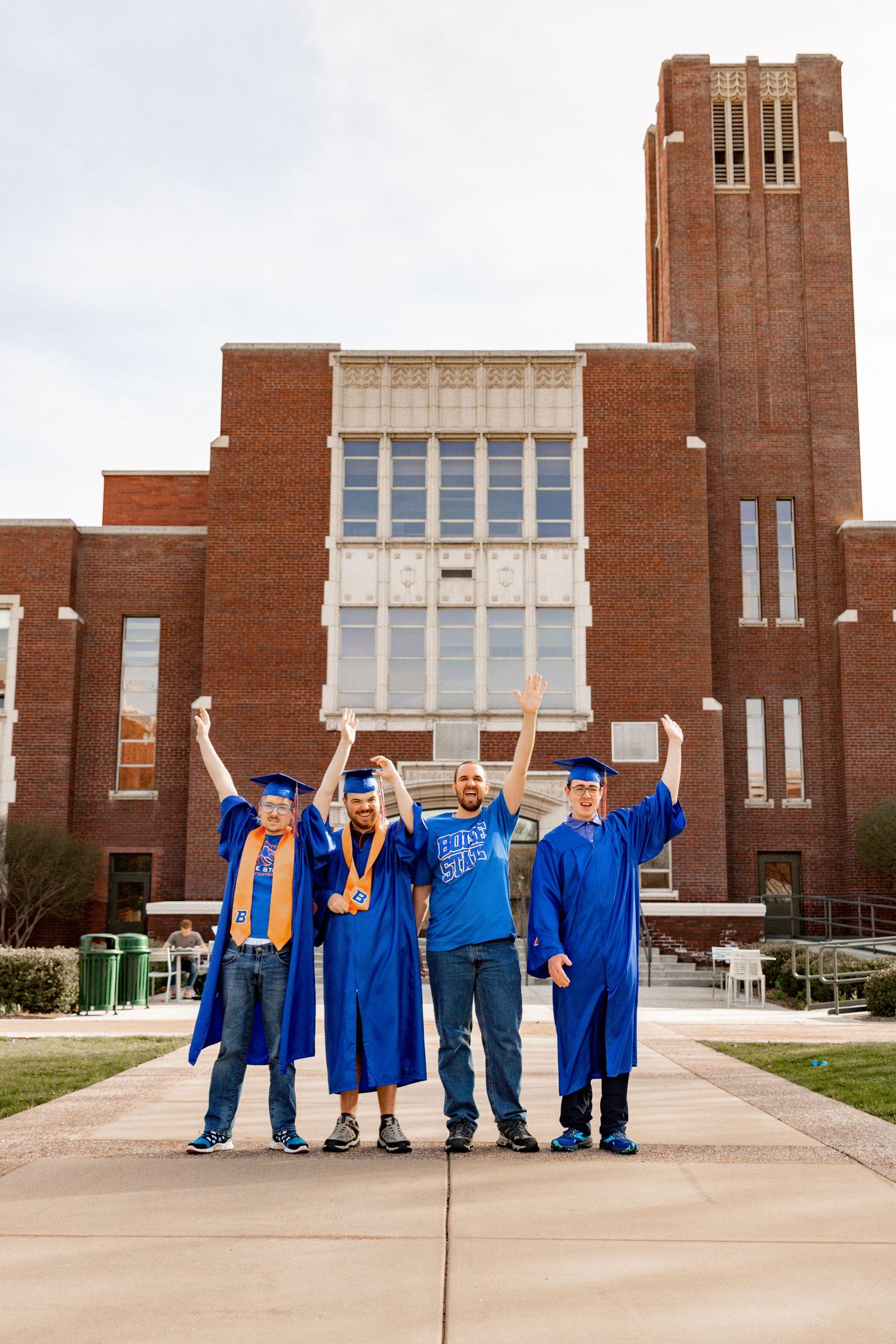 a group of grads cheering