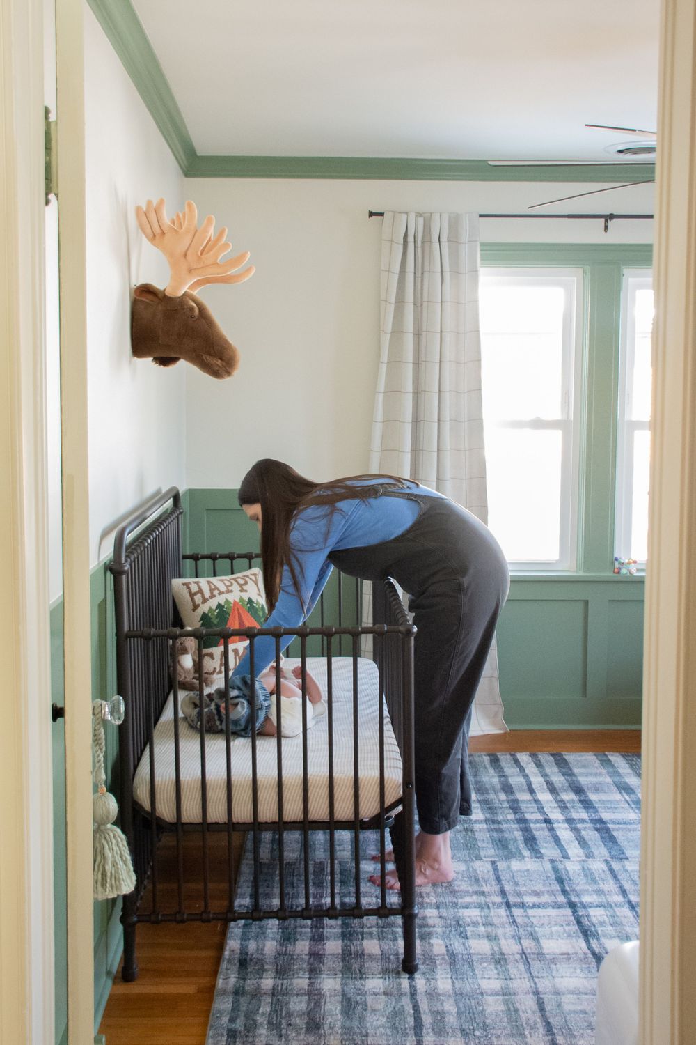 a family by a crib