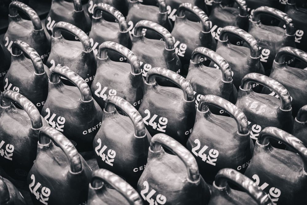 An army of identical metallic sentinels stands in perfect formation, their symmetry a meditation on mass production and the beauty of indust